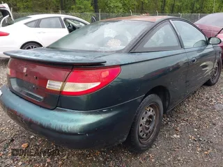 1997 Saturn SC z VIN 1G8ZG1277VZ342397, wystawiony jako IAAI lot #41966570 z przebiegiem 184 054 mil mil oraz . Historia ofert i sprzedaży dostępna na DreamBid. Obrazek 4.