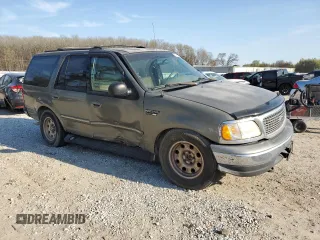 1999 Ford Expedition XLT z VIN 1FMPU18L5XLB14460, wystawiony jako Copart lot #50680605 z przebiegiem Nie podano mil oraz Szkoda całkowita • Salvage title. Historia ofert i sprzedaży dostępna na DreamBid. Obrazek 4.