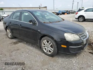 2007 Volkswagen Jetta Wolfsburg Edition z VIN 3VWEF71K77M087560, wystawiony jako Copart lot #60809985 z przebiegiem 151 561 mil mil oraz Szkoda całkowita • Salvage title. Historia ofert i sprzedaży dostępna na DreamBid. Obrazek 4.