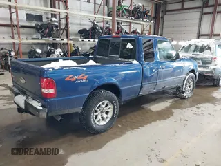 2009 Ford Ranger XLT with VIN 1FTZR45E09PA56081, listed as a IAAI auction lot 41389308 with 118,471 mi miles. Bid and sale history available at carsss.com. Image 4.