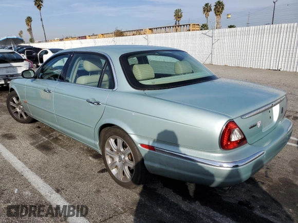 2005 Jaguar XJ with VIN SAJWA79C15SG47018, listed as a Copart auction lot 43087185 with 31,725 mi miles and Salvage Title. Bid and sale history available at carsss.com. Image 2.