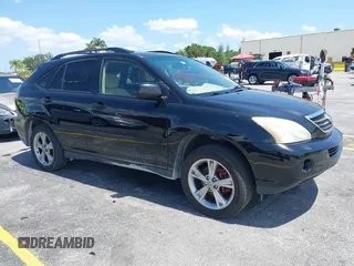 2006 Lexus RX 400h z VIN JTJHW31U260006005, wystawiony jako IAAI lot #42302169 z przebiegiem 233 623 mil mil oraz . Historia ofert i sprzedaży dostępna na DreamBid. Obrazek 1.
