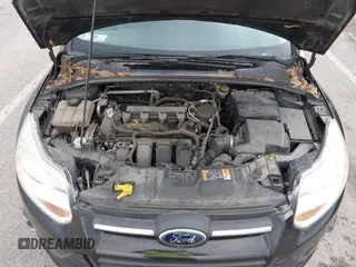 2014 Ford Focus SE with VIN 1FADP3K22EL325404, listed as a IAAI auction lot 42060162 with 115,265 mi miles. Bid and sale history available at carsss.com. Image 10.