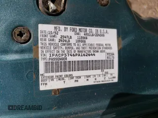 1993 Ford Taurus z VIN 1FACP5746PA162644, wystawiony jako Copart lot #74177004 z przebiegiem 37 125 mil mil oraz Czysty tytuł • Clean title. Historia ofert i sprzedaży dostępna na DreamBid. Obrazek 12.