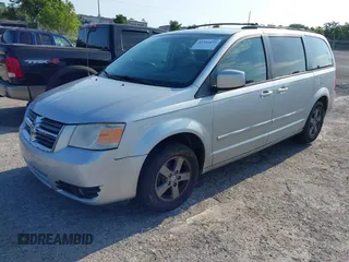 2009 Dodge Grand Caravan SXT z VIN 2D8HN54189R671683, wystawiony jako IAAI lot #42350455 z przebiegiem 220 306 mil mil oraz . Historia ofert i sprzedaży dostępna na DreamBid. Obrazek 2.
