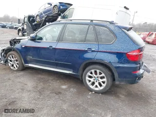 2011 BMW X5 35i with VIN 5UXZV4C54BL738262, listed as a IAAI auction lot 41633474 with 173,914 mi miles. Bid and sale history available at carsss.com. Image 3.