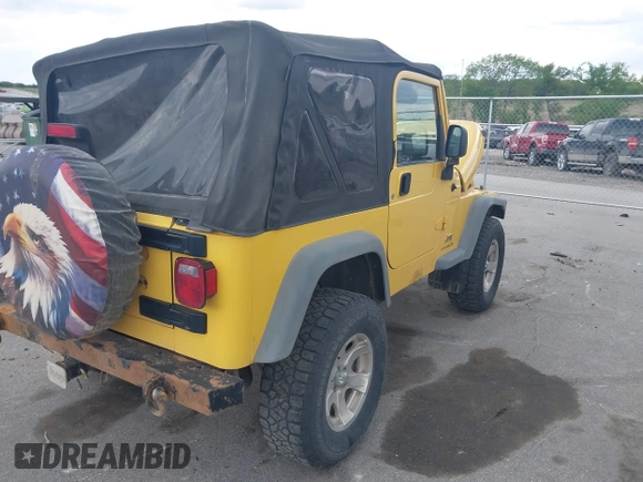 2005 Jeep Wrangler SE z VIN 1J4FA29S95P373313, wystawiony jako IAAI lot #42340611 z przebiegiem 162 801 mil mil oraz . Historia ofert i sprzedaży dostępna na DreamBid. Obrazek 4.