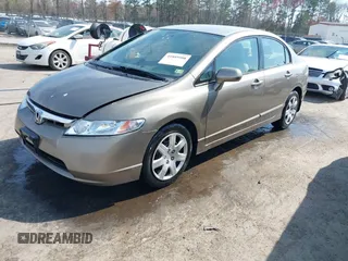 2006 Honda Civic LX with VIN 2HGFA16596H514483, listed as a IAAI auction lot 41889508 with 148,412 mi miles and . Bid and sale history available at DreamBid. Image 17.