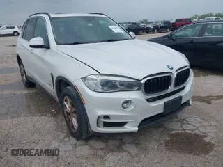 2014 BMW X5 sDrive35i with VIN 5UXKR2C57E0C01873, listed as a IAAI auction lot 41898437 with 164,936 mi miles. Bid and sale history available at carsss.com. Image 1.