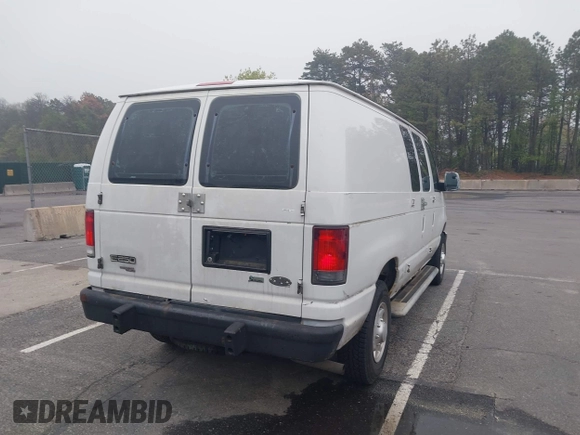 2012 Ford Econoline Cargo Recreational with VIN 1FTNE2EW8CDA64042, listed as a IAAI auction lot 42197470 with 130,647 mi miles. Bid and sale history available at carsss.com. Image 4.