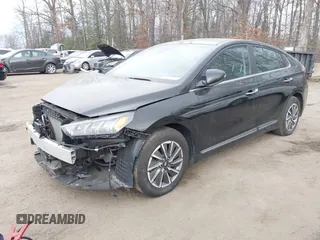 2021 Hyundai Ioniq Limited with VIN KMHC85LJ1MU079180, listed as a IAAI auction lot 41503959 with 33,679 mi miles and . Bid and sale history available at DreamBid. Image 2.