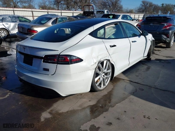 2022 Tesla Model S Plaid with VIN 5YJSA1E63NF483873, listed as a IAAI auction lot 41204003 with 15 mi miles. Bid and sale history available at carsss.com. Image 4.