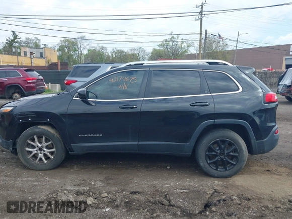 2014 Jeep Cherokee Latitude with VIN 1C4PJMCS0EW208092, listed as a IAAI auction lot 42174675 with 202,871 mi miles and . Bid and sale history available at carsss.com. Image 14.