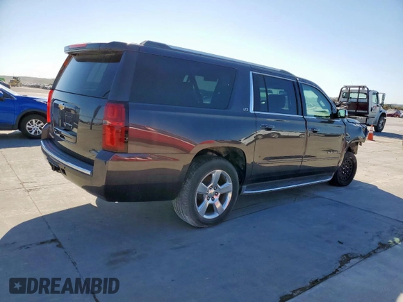 2016 Chevrolet Suburban LTZ with VIN 1GNSCJKC5GR170929, listed as a Copart auction lot 49634725 with Not provided miles and Salvage title. Bid and sale history available at DreamBid. Image 3.