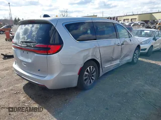 2023 Chrysler Pacifica Hybrid Limited with VIN 2C4RC1S78PR551260, listed as a IAAI auction lot 41992752 with 55,136 mi miles and . Bid and sale history available at DreamBid. Image 4.