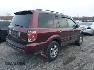 2008 Honda Pilot EX-L with VIN 5FNYF18508B015960, listed as a IAAI auction lot 41511626 with 207,141 mi miles. Bid and sale history available at carsss.com. Image 4.