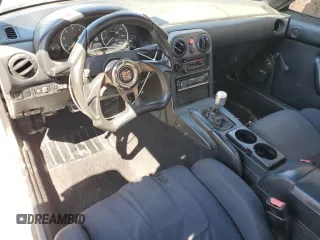 1990 Mazda MX-5 Miata z VIN JM1NA3511L0106323, wystawiony jako Copart lot #50449685 z przebiegiem 179 018 mil mil oraz Szkoda całkowita • Salvage title. Historia ofert i sprzedaży dostępna na DreamBid. Obrazek 8.