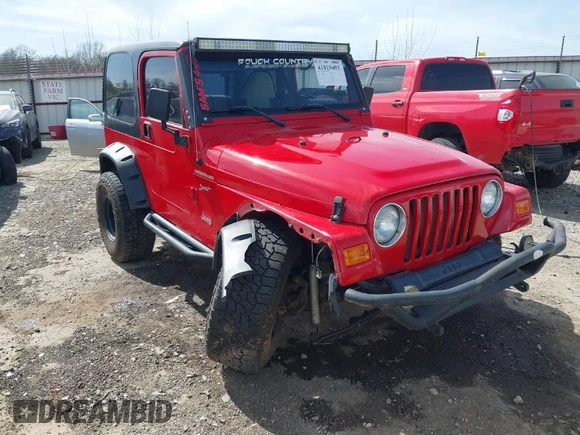 2002 Jeep Wrangler Sport with VIN 1J4FA49S42P771262, listed as a IAAI auction lot 41819403 with 132,871 mi miles. Bid and sale history available at carsss.com. Image 1.
