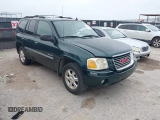 2006 GMC Envoy SLE z VIN 1GKDT13S862220306, wystawiony jako IAAI lot #42285357 z przebiegiem 224 944 mil mil oraz . Historia ofert i sprzedaży dostępna na DreamBid. Obrazek 1.