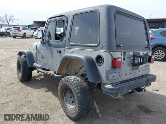 2002 Jeep Wrangler X with VIN 1J4FA39S82P707610, listed as a IAAI auction lot 41709953 with 1 mi miles. Bid and sale history available at carsss.com. Image 3.