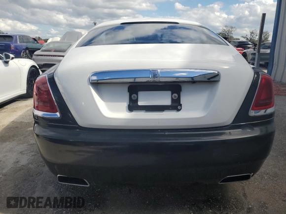2014 Rolls-Royce Wraith z VIN SCA665C59EUX84411, wystawiony jako Copart lot #74548964 z przebiegiem Nie podano mil oraz Nie do naprawy. Historia ofert i sprzedaży dostępna na DreamBid. Obrazek 6.