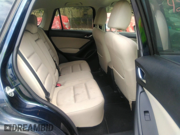 2014 Mazda CX-5 Touring z VIN JM3KE2CYXE0429149, wystawiony jako IAAI lot #42471772 z przebiegiem 222 440 mil mil oraz . Historia ofert i sprzedaży dostępna na DreamBid. Obrazek 8.