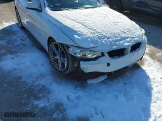 2016 BMW 4 Series 428i with VIN WBA4A9C50GG696366, listed as a IAAI auction lot 41615789 with 103,763 mi miles. Bid and sale history available at carsss.com. Image 17.
