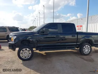2020 Ford F-150 XL with VIN 1FTEW1E59LKE70874, listed as a IAAI auction lot 41479554 with 104,957 mi miles. Bid and sale history available at carsss.com. Image 14.