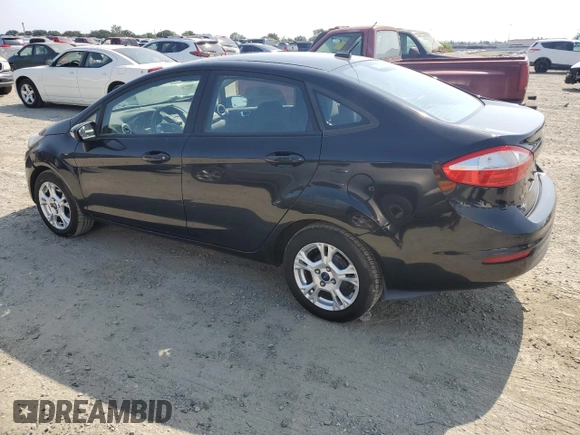 2015 Ford Fiesta SE z VIN 3FADP4BJXFM146122, wystawiony jako Copart lot #59998625 z przebiegiem 114 191 mil mil oraz Czysty tytuł • Clean title. Historia ofert i sprzedaży dostępna na DreamBid. Obrazek 2.
