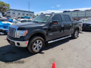 2012 Ford F-150 XL with VIN 1FTFW1ET2CKE07800, listed as a Copart auction lot 61766105 with 147,164 mi miles and Salvage title. Bid and sale history available at DreamBid. Image 1.