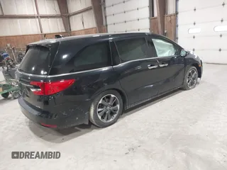 2023 Honda Odyssey Elite z VIN 5FNRL6H95PB016114, wystawiony jako IAAI lot #41865786 z przebiegiem 32 700 mil mil oraz . Historia ofert i sprzedaży dostępna na DreamBid. Obrazek 4.