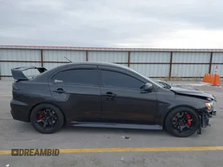 2013 Mitsubishi Lancer Evolution GSR with VIN JA32W8FV8DU012080, listed as a IAAI auction lot 41379744 with 95,070 mi miles. Bid and sale history available at carsss.com. Image 14.