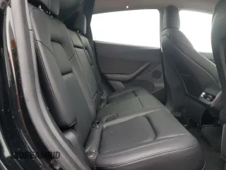 2022 Tesla Model Y Performance z VIN 7SAYGDEF9NF382883, wystawiony jako Copart lot #52028085 z przebiegiem 49 108 mil mil oraz Szkoda całkowita • Salvage title. Historia ofert i sprzedaży dostępna na DreamBid. Obrazek 10.