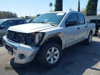 2012 Nissan Titan SV with VIN 1N6BA0EK5CN312092, listed as a IAAI auction lot 41881794 with 65,673 mi miles. Bid and sale history available at carsss.com. Image 2.