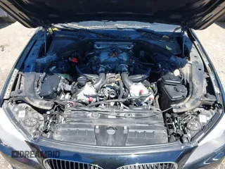 2012 BMW 7 Series 750i with VIN WBAKA8C50CCY37892, listed as a IAAI auction lot 42080313 with 148,058 mi miles. Bid and sale history available at carsss.com. Image 10.