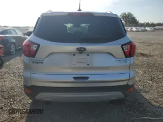 2019 Ford Escape Titanium with VIN 1FMCU9J92KUA78127, listed as a Copart auction lot 58488255 with 82,956 mi miles and Non repairable. Bid and sale history available at DreamBid. Image 6.