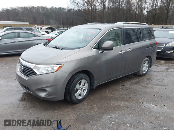 2014 Nissan Quest S with VIN JN8AE2KP0E9107133, listed as a IAAI auction lot 41561516 with 227,656 mi miles and . Bid and sale history available at DreamBid. Image 2.