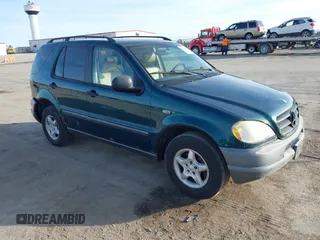 1998 Mercedes-Benz M-Class with VIN 4JGAB54E7WA034632, listed as a IAAI auction lot 41523291 with 153,241 mi miles. Bid and sale history available at carsss.com. Image 1.