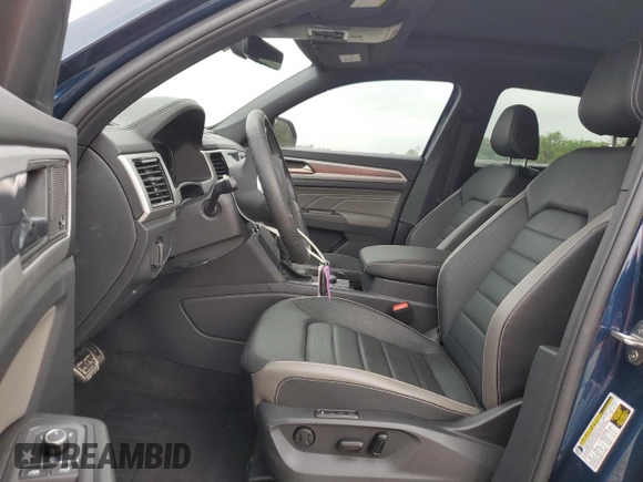 2023 Volkswagen Atlas SEL Premium R-Line z VIN 1V2FE2CA7PC224093, wystawiony jako Copart lot #59274104 z przebiegiem 6 716 mil mil oraz Czysty tytuł • Clean title. Historia ofert i sprzedaży dostępna na DreamBid. Obrazek 7.