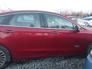 2017 Ford Fusion Energi SE with VIN 3FA6P0PU3HR277659, listed as a IAAI auction lot 41297011 with 119,244 mi miles. Bid and sale history available at carsss.com. Image 13.