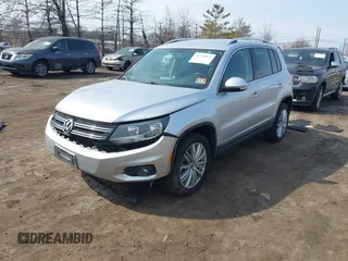 2012 Volkswagen Tiguan S z VIN WVGBV7AX9CW571627, wystawiony jako IAAI lot #41710871 z przebiegiem 157 998 mil mil oraz . Historia ofert i sprzedaży dostępna na DreamBid. Obrazek 17.