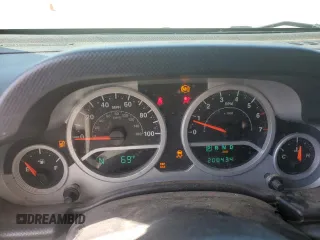 2008 Jeep Wrangler Unlimited Sahara with VIN 1J4GA59158L550576, listed as a Copart auction lot 53095565 with 208,434 mi miles and Salvage Title. Bid and sale history available at DreamBid. Image 9.