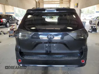 2014 Toyota Sienna SE with VIN 5TDXK3DC5ES418508, listed as a Copart auction lot 69742974 with 210,168 mi miles and Salvage Title. Bid and sale history available at DreamBid. Image 6.