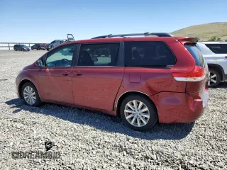 2012 Toyota Sienna XLE with VIN 5TDDK3DC0CS041425, listed as a Copart auction lot 60286305 with 214,634 mi miles and Salvage title. Bid and sale history available at DreamBid. Image 2.