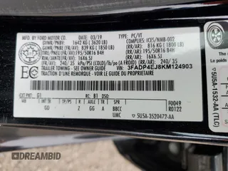 2019 Ford Fiesta SE z VIN 3FADP4EJ8KM124903, wystawiony jako Copart lot #54560125 z przebiegiem 86 616 mil mil oraz Szkoda całkowita • Salvage title. Historia ofert i sprzedaży dostępna na DreamBid. Obrazek 13.