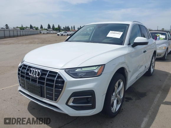 2021 Audi Q5 Premium Plus with VIN WA1BAAFY0M2069879, listed as a IAAI auction lot 42009952 with 44,686 mi miles. Bid and sale history available at carsss.com. Image 2.