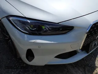 2022 BMW 4 Series 430i xDrive with VIN WBA73AP09NCJ28175, listed as a IAAI auction lot 41486064 with 27,312 mi miles and . Bid and sale history available at DreamBid. Image 21.