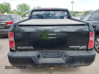 2011 Honda Ridgeline RT z VIN 5FPYK1F22BB451857, wystawiony jako IAAI lot #42253277 z przebiegiem 109 720 mil mil oraz . Historia ofert i sprzedaży dostępna na DreamBid. Obrazek 16.