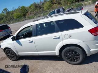 2017 Dodge Journey SE with VIN 3C4PDCAB5HT569154, listed as a IAAI auction lot 41891552 with 126,861 mi miles and . Bid and sale history available at DreamBid. Image 14.