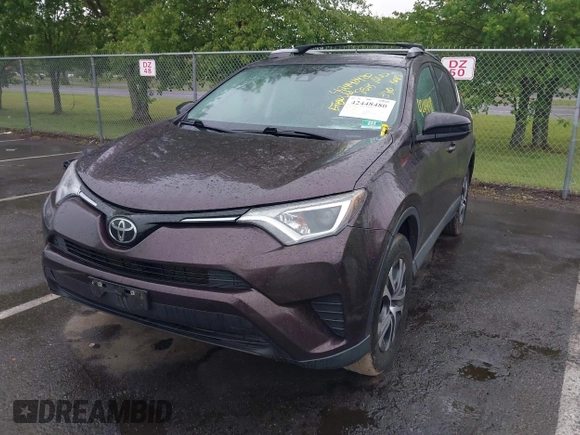 2018 Toyota RAV4 LE with VIN 2T3BFREV9JW857284, listed as a IAAI auction lot 42448480 with 85,551 mi miles and . Bid and sale history available at DreamBid. Image 17.